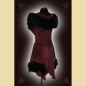 Preview: Dress made of burgundy suede. Decorated with lavish sheepskin trim, black trimmings, and black ornaments at the neckline and side panels. The skirt section shows the natural edges of the goat suede.