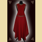 Preview: Kleid aus weinrotem Rindveloursleder und einem fließenden Textilgewebe. Das Kleid ist verziert mit einer aufwändigen, goldenen Stickerei in Form eines keltischen Kreuzes und einer mittelalterlichen Kassettenborte.