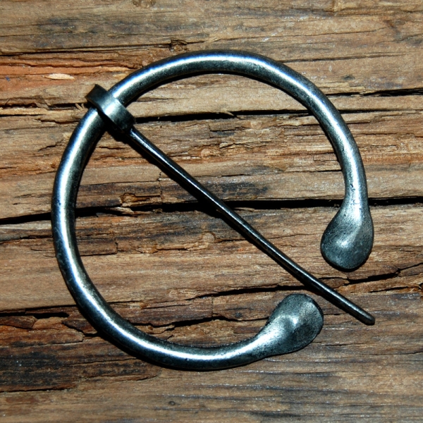 Omega brooch