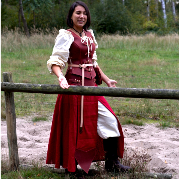 Battle skirt made of carmine red linen and red oiled leather