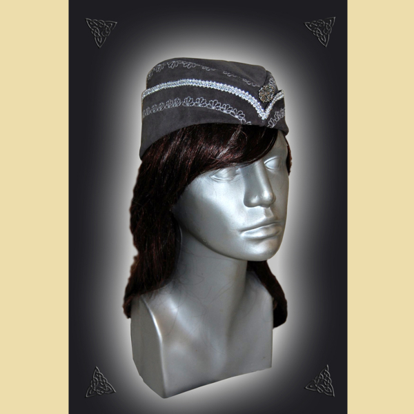 Forage cap made of grey suede leather. Decorated with silver braiding and decorative studs.