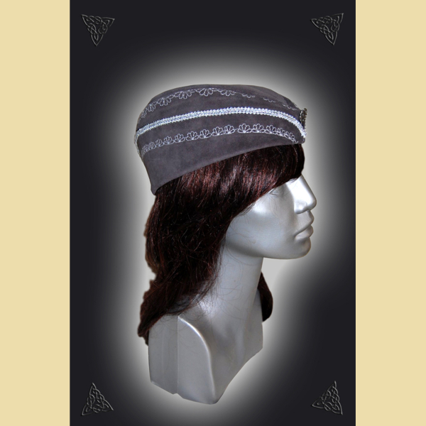 Forage cap made of grey suede leather. Decorated with silver braiding and decorative studs.