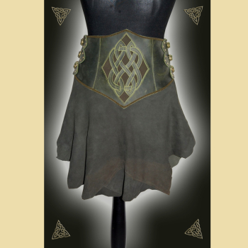 Skirt with a wide waistband made of olive-green oiled leather and goatskin suede. It is embellished with a Celtic knot and trimmings